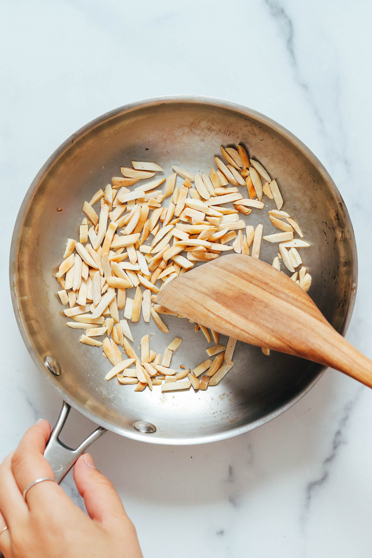 Toasting slivered almonds in a small skillet